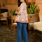 Petal Mist Mul Cotton Flared Top in White with Pearled V Neckline