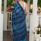 Hand block printed cotton saree in blue symphony and striking motifs