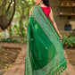 Refined Green Cotton Saree with Hand Block Printed Slogan Border & Contrasting Pink Accents