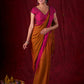 Autumn Rust Mul Cotton Saree with Pink Striped Border, Delicate Black Detailing & Tassel Highlights
