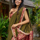 Regal olive tissue saree enhanced by intricate Banarasi brocade border