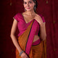 Autumn Rust Mul Cotton Saree with Pink Striped Border, Delicate Black Detailing & Tassel Highlights