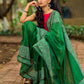 Refined Green Cotton Saree with Hand Block Printed Slogan Border & Contrasting Pink Accents