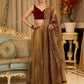 Regal ensemble gold tissue lehenga with intricate embroidery and a stunning velvet blouse  - Dupatta Optional