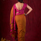 Autumn Rust Mul Cotton Saree with Pink Striped Border, Delicate Black Detailing & Tassel Highlights
