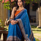 Elegant Blue Saree with Geometric Kalamkari Border and Contrasting Orange Accents