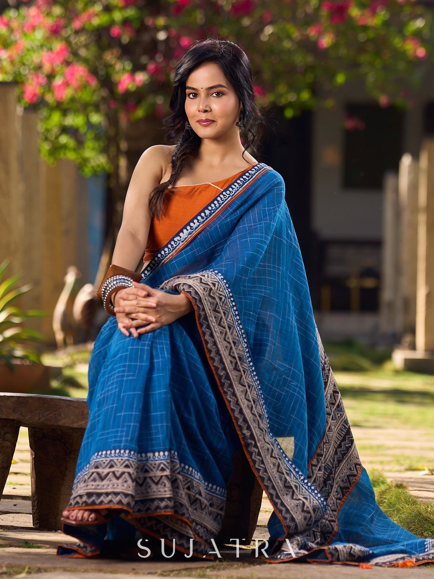 Elegant Blue Saree with Geometric Kalamkari Border and Contrasting Orange Accents