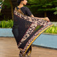 Vibrant Black Georgette Saree with Golden Zari Border & Kalamkari Floral Print Pallu & Border