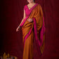 Autumn Rust Mul Cotton Saree with Pink Striped Border, Delicate Black Detailing & Tassel Highlights