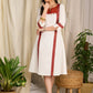 Elegant white cotton dress with bold block print and intricate detailing