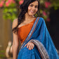 Elegant Blue Saree with Geometric Kalamkari Border and Contrasting Orange Accents