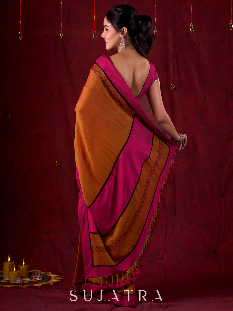 Autumn Rust Mul Cotton Saree with Pink Striped Border, Delicate Black Detailing & Tassel Highlights