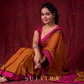 Autumn Rust Mul Cotton Saree with Pink Striped Border, Delicate Black Detailing & Tassel Highlights