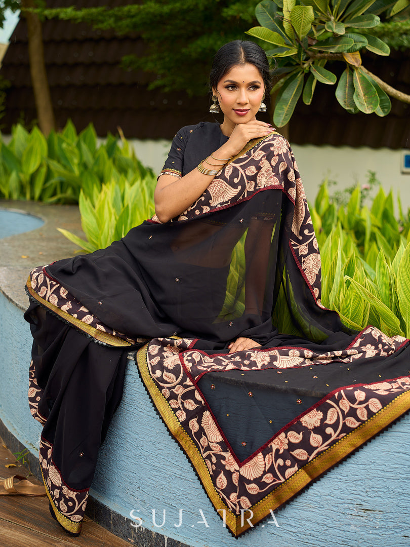 Vibrant Black Georgette Saree with Golden Zari Border & Kalamkari Floral Print Pallu & Border