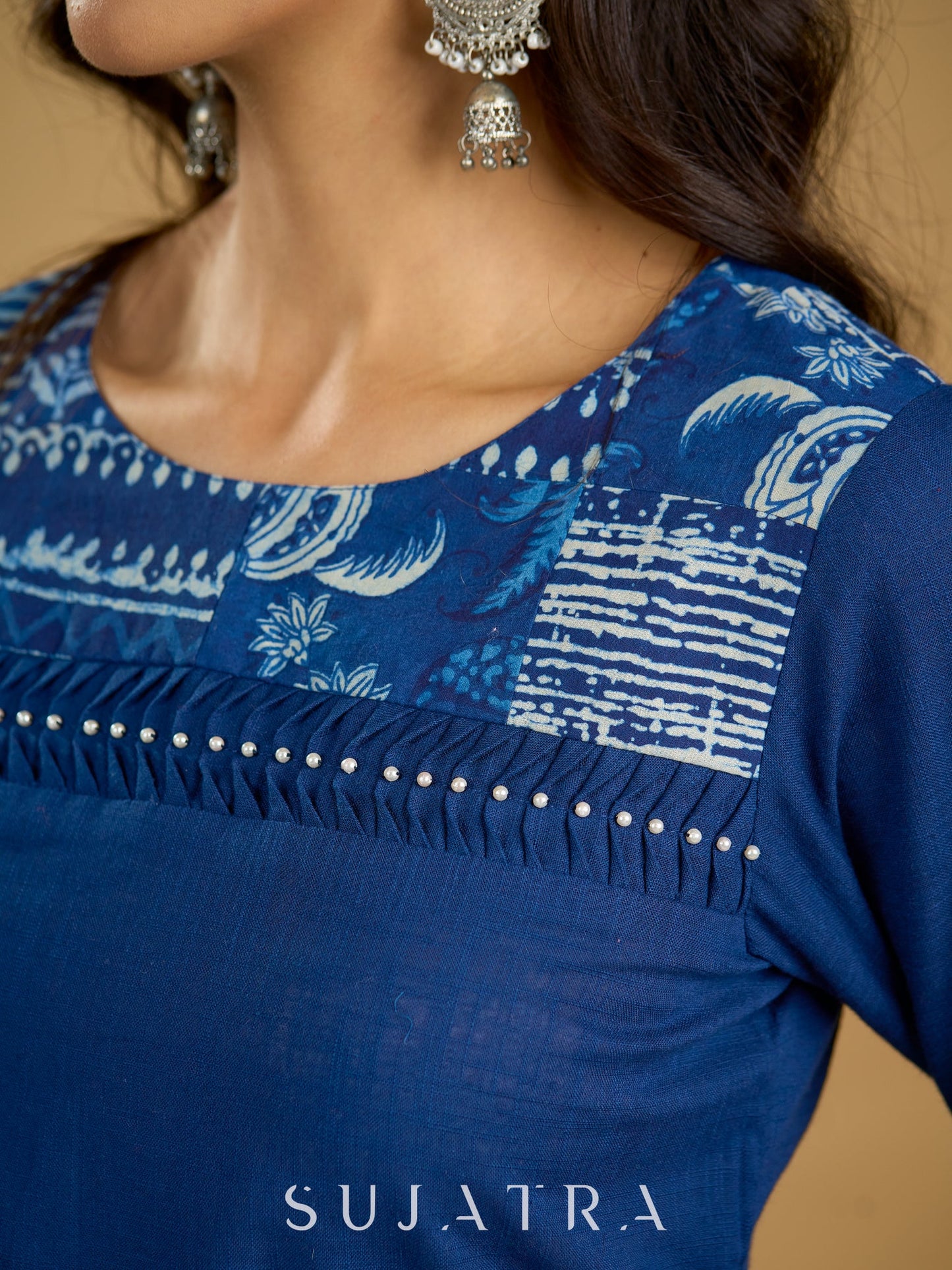 Classic indigo cotton patchwork top with  subtle pearl highlights