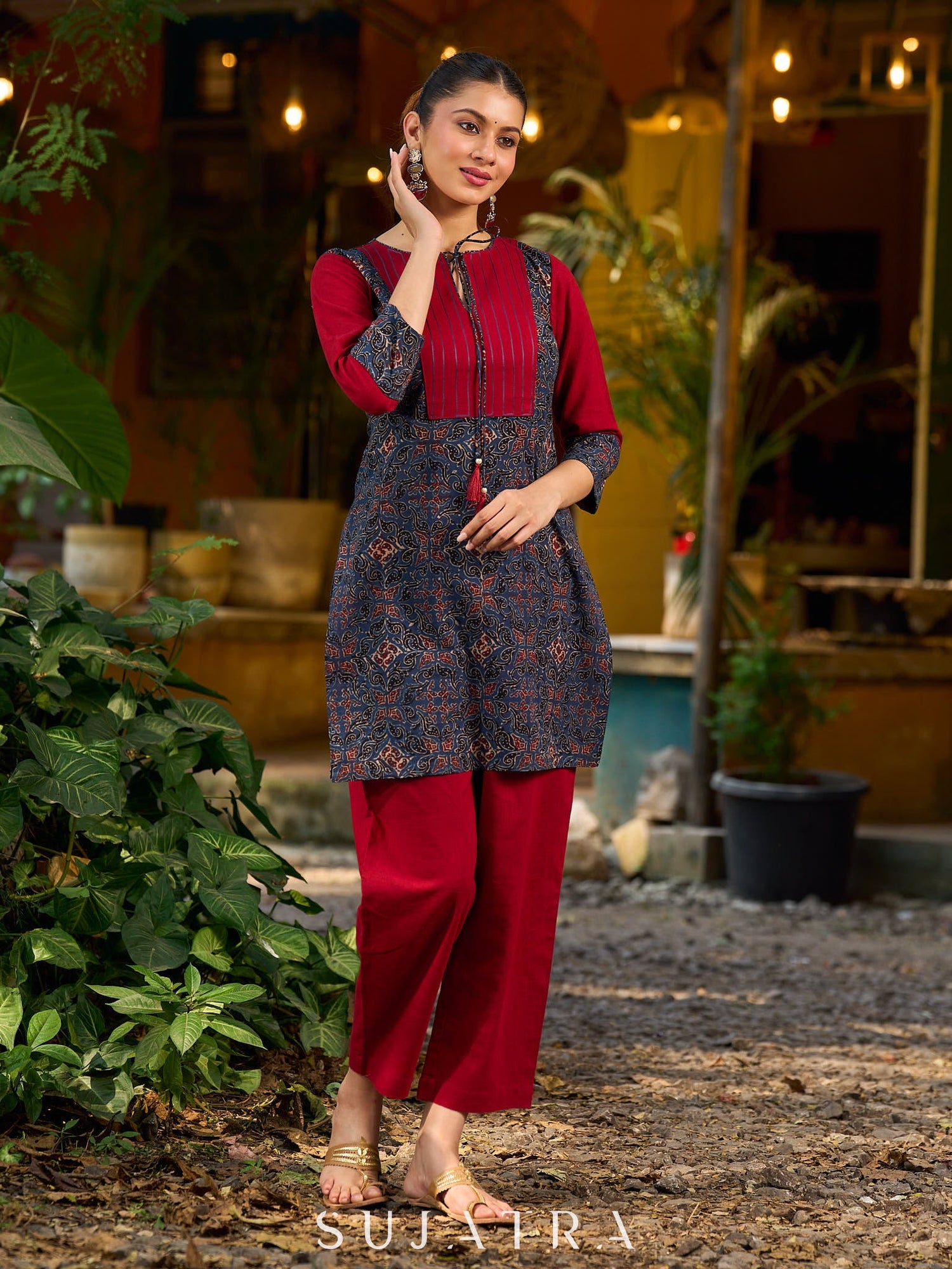 Blue Ajrakh short kurta with a handcrafted maroon patch.