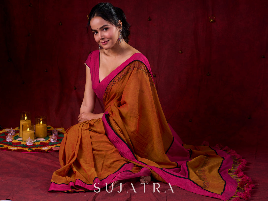 Autumn Rust Mul Cotton Saree with Pink Striped Border, Delicate Black Detailing & Tassel Highlights
