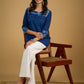 Classic indigo cotton patchwork top with  subtle pearl highlights