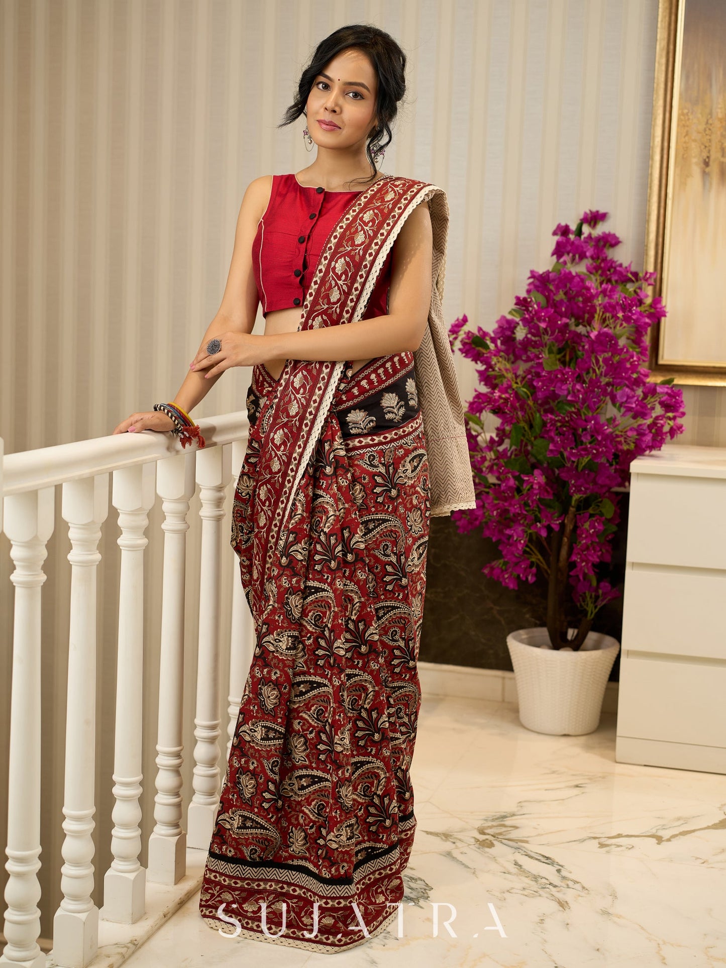 Maroon magic in bold paisley hand block prints on cotton saree