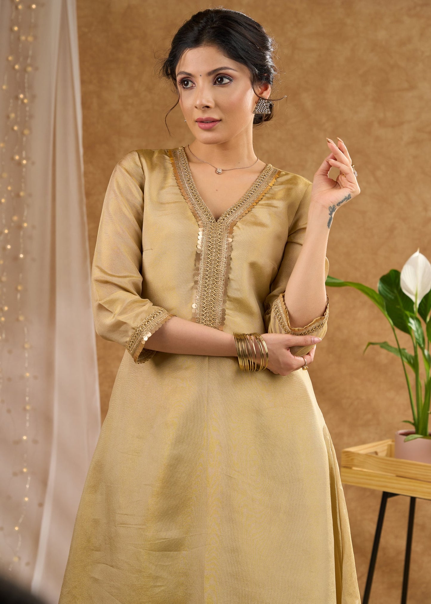 Subtle golden tissue A line kurta with tissue pant Dupatta optional