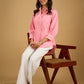Delicate hand painting enhances this baby pink collared cotton top