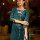 bottle green solid kurta with a refined ajrakh edging.
