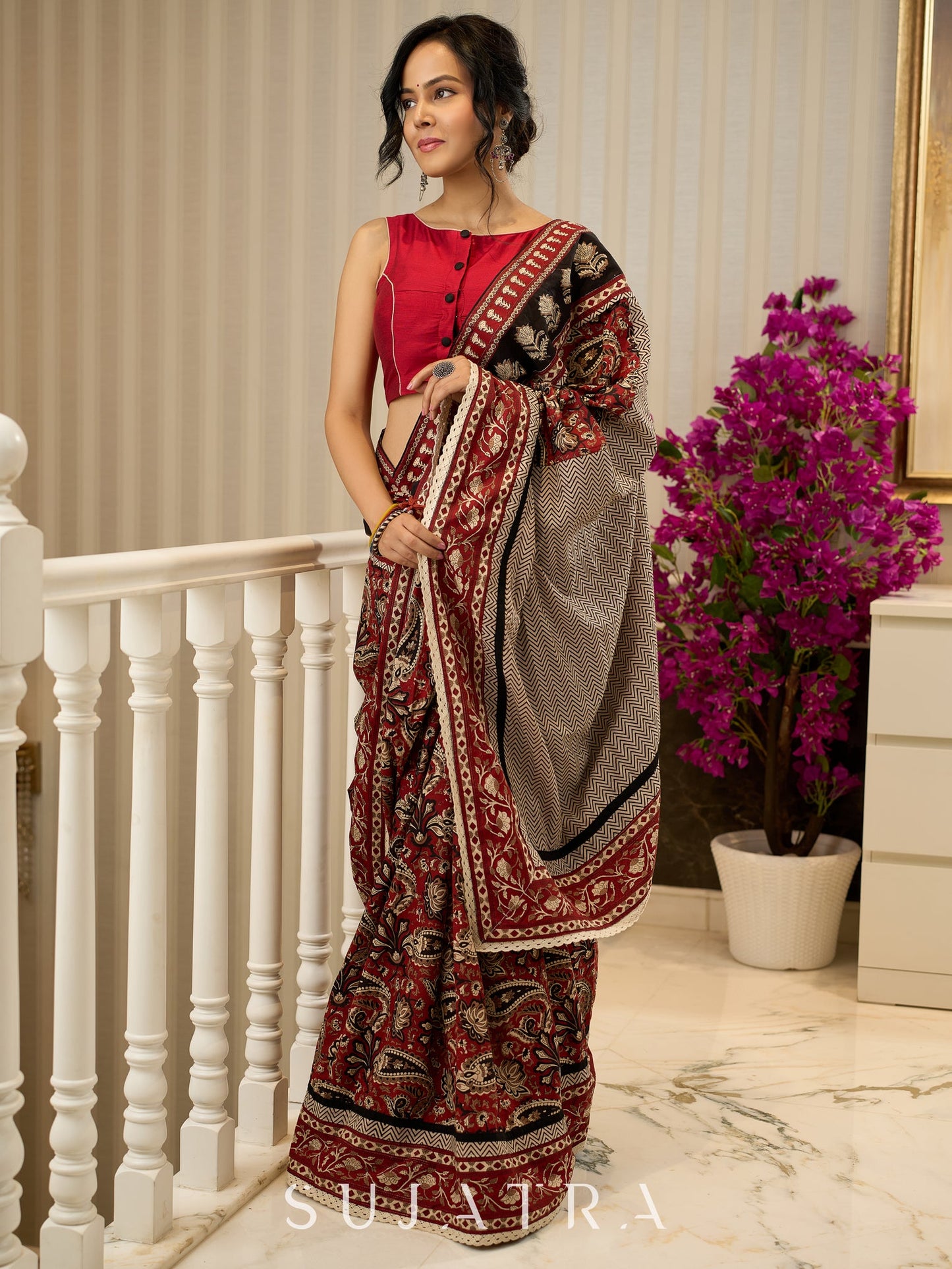 Maroon magic in bold paisley hand block prints on cotton saree
