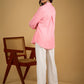 Delicate hand painting enhances this baby pink collared cotton top