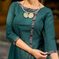 bottle green solid kurta with a refined ajrakh edging.