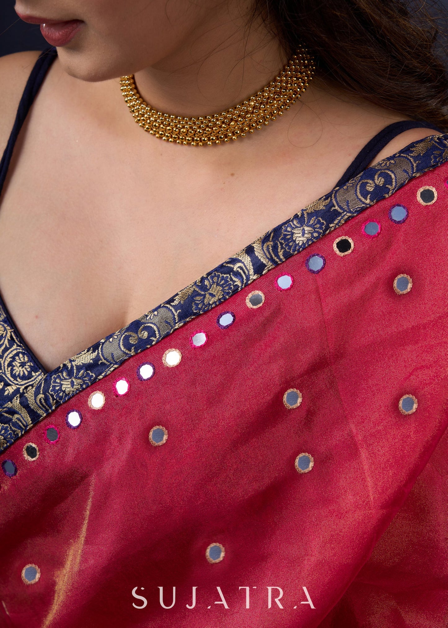 Mesmerizing Tissue Saree with all-over mirror work detailing highlighted with Banaseri Border