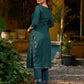 bottle green solid kurta with a refined ajrakh edging.