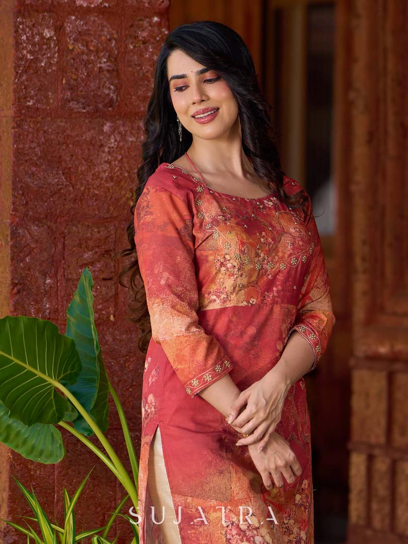 Amber crimson blossom printed kurta with golden pearl handwork on the yoke and dainty tie-up neck details.
