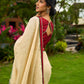 Statement Cream Cotton Saree with Pichwai Cow Painting & Contrast Trim