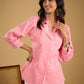Delicate hand painting enhances this baby pink collared cotton top