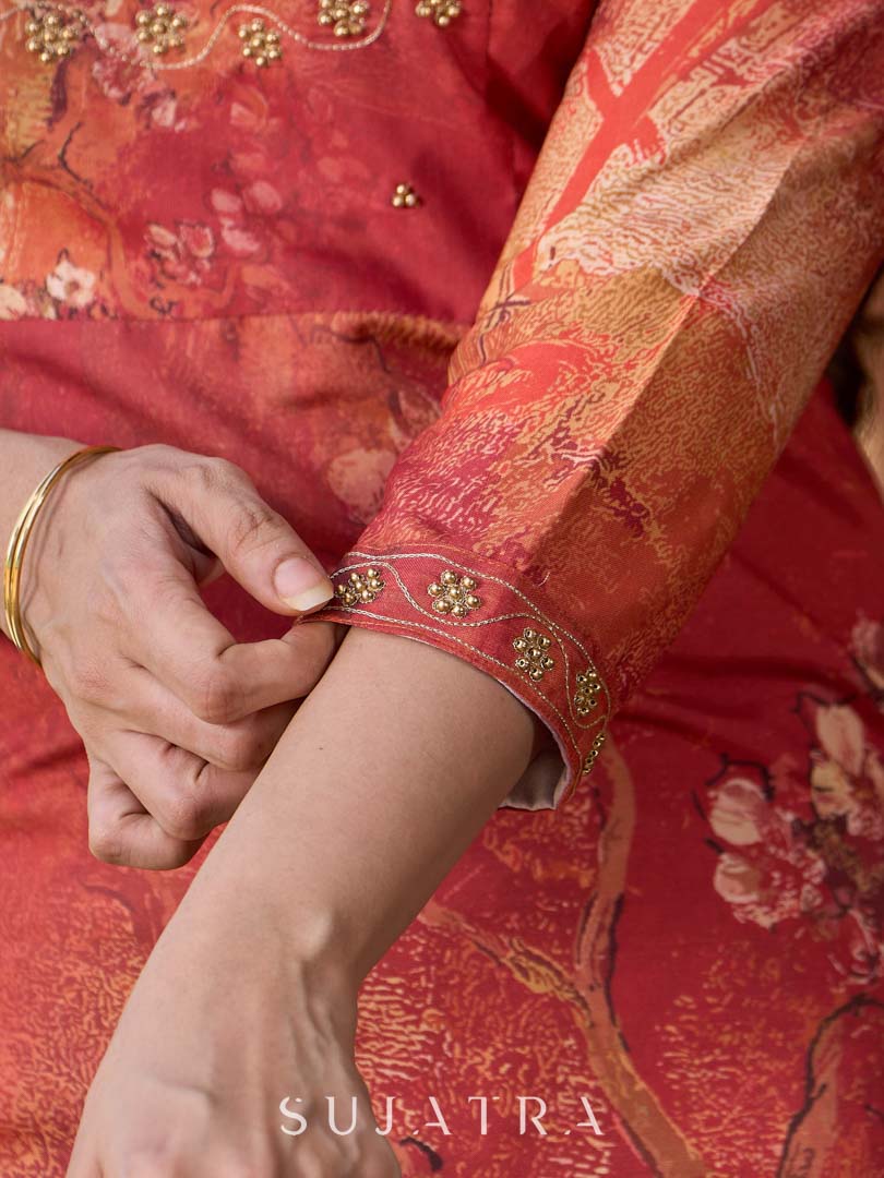 Amber crimson blossom printed kurta with golden pearl handwork on the yoke and dainty tie-up neck details.