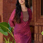 Exquisite deep burgundy printed kurta with intricate neck panel embroidery, delicate green beads, and refined green highlights.