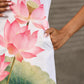 Graceful White lotus printed dress with elegant olive accents.