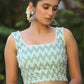 Turquoise Chikankari Sleeveless Blouse with Pompom Lace Detailing