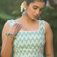 Turquoise Chikankari Sleeveless Blouse with Pompom Lace Detailing