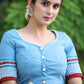 Powder Blue Cotton Blouse with Contrast Embroidery at the Back and on the Sleeves with Maroon Frill Detailing