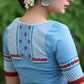Powder Blue Cotton Blouse with Contrast Embroidery at the Back and on the Sleeves with Maroon Frill Detailing