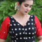 Standout Black Ikat Cotton Blouse with Red Cotton Silk Sleeves and Mirrorwork Detailing