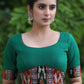 Trendy Bottle Green Cotton Blouse with Border Ikat Combination and Wooden Button Detailing at the Back
