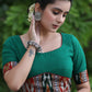 Trendy Bottle Green Cotton Blouse with Border Ikat Combination and Wooden Button Detailing at the Back