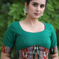 Trendy Bottle Green Cotton Blouse with Border Ikat Combination and Wooden Button Detailing at the Back