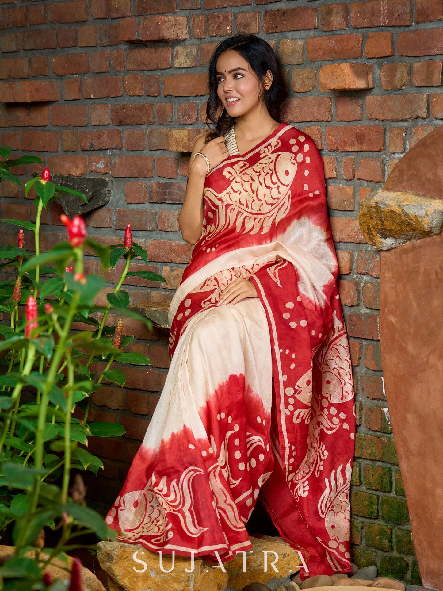 Pure silk masterpiece saree with statement fish patterns