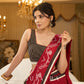 Exquisite Jamdani saree in regal red with intricate motifs and lace borders