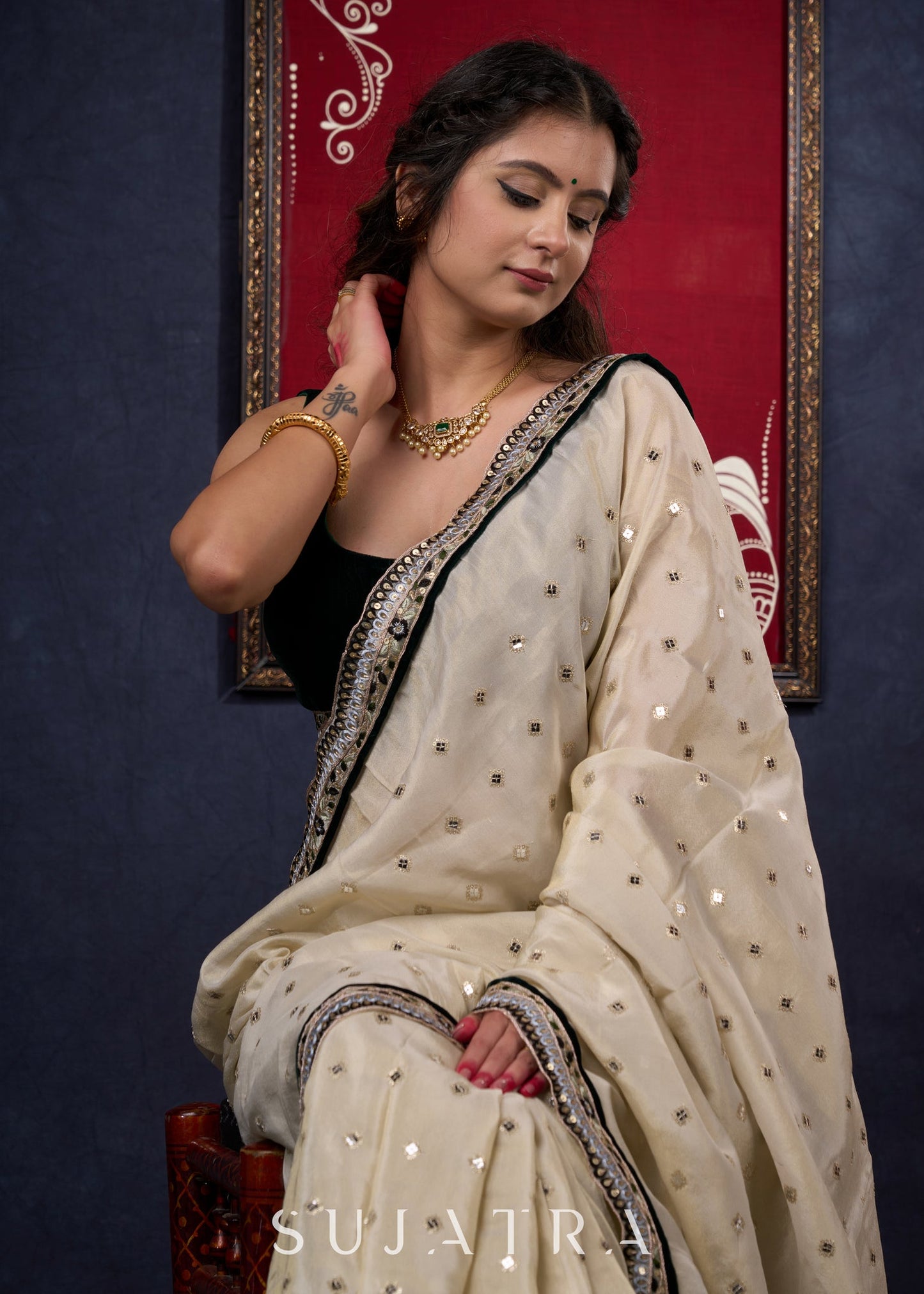 Classy Tissue saree with all-over work Highlighted with Beautiful border