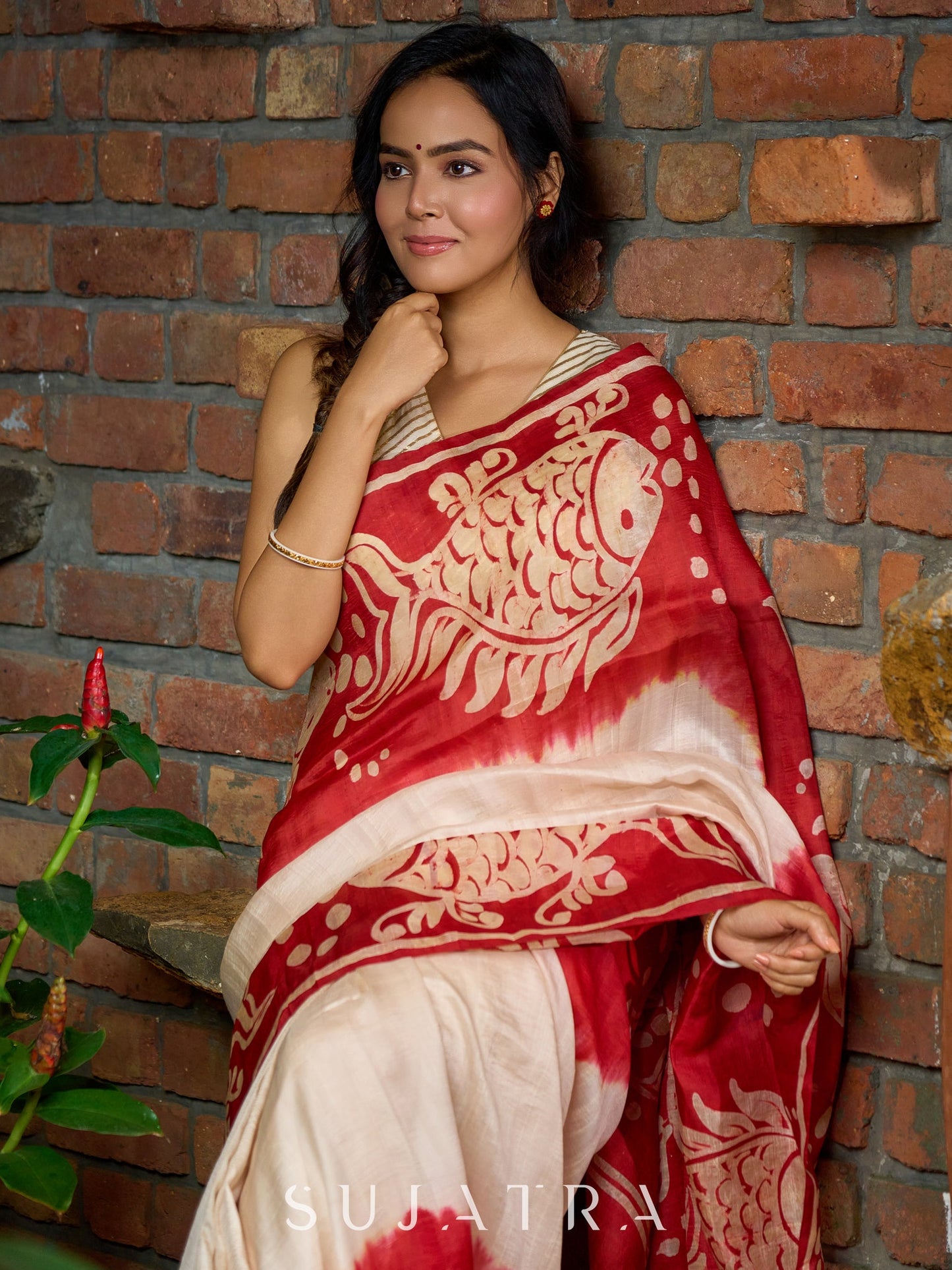 Pure silk masterpiece saree with statement fish patterns