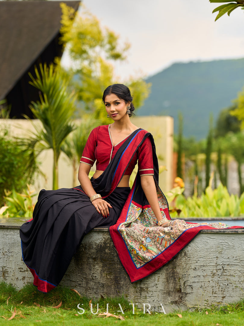 Striking Black Modal Saree with Hand-Painted Madhubani Pallu & Maroon-Blue Border